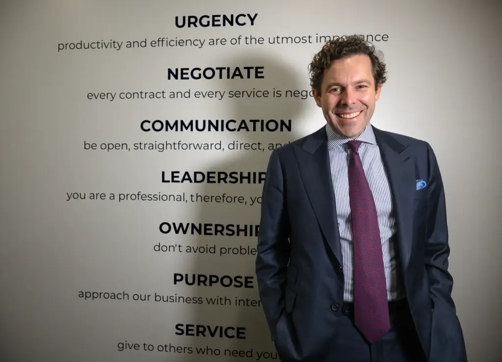President and CEO of Sunwest Bank, Carson Lappetito, inside the...