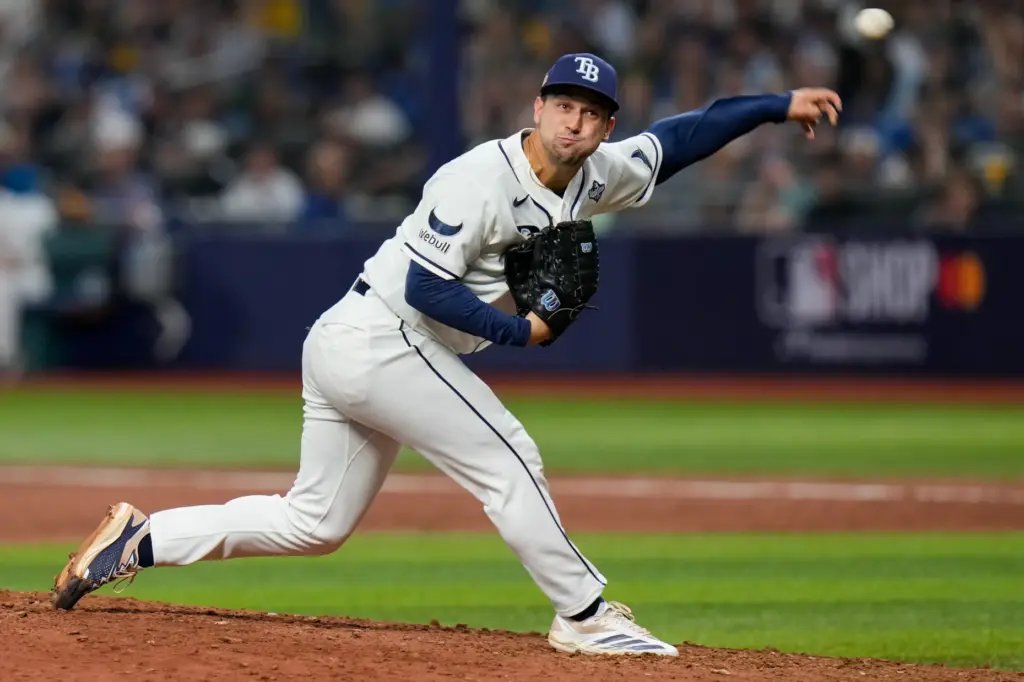 Tampa Bay Rays pitcher Ian Seymour throws during the ninth...