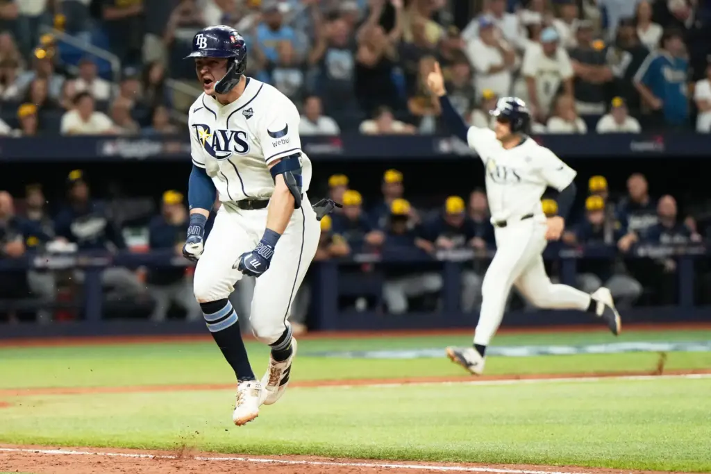 The Tampa Bay Rays’ Ben Williamson celebrates as he runs...