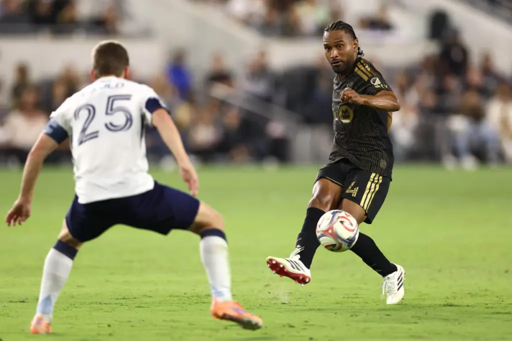 Los Angeles FC defender Eddie Segura (4) kicks the ball...
