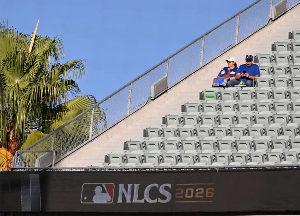 Fans sit in the reserve section before Game 4 of...