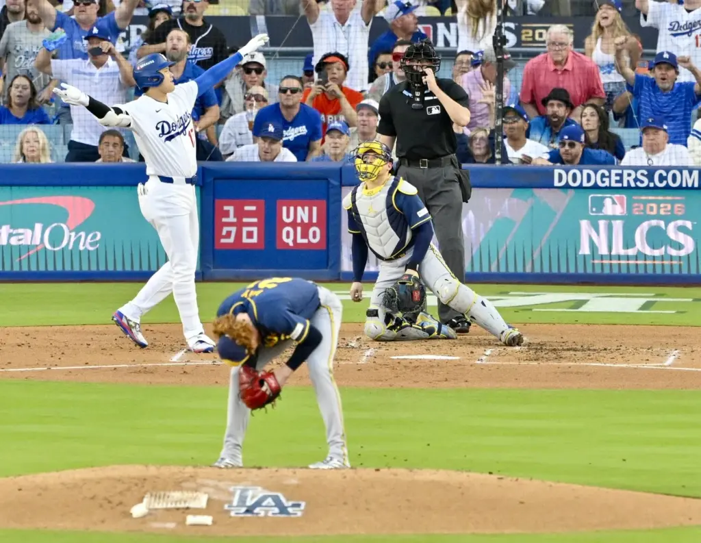 Dodgers star Shohei Ohtani celebrates after hitting a three-run home...