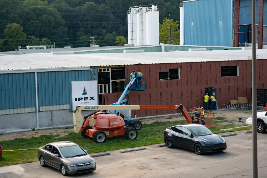 Construction work is done on the outside of the IPEX...