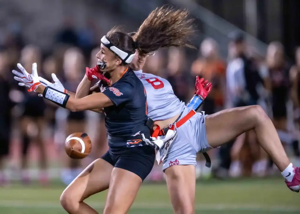 Mater Dei safety Allyson Schmida (8), right, breaks up a...