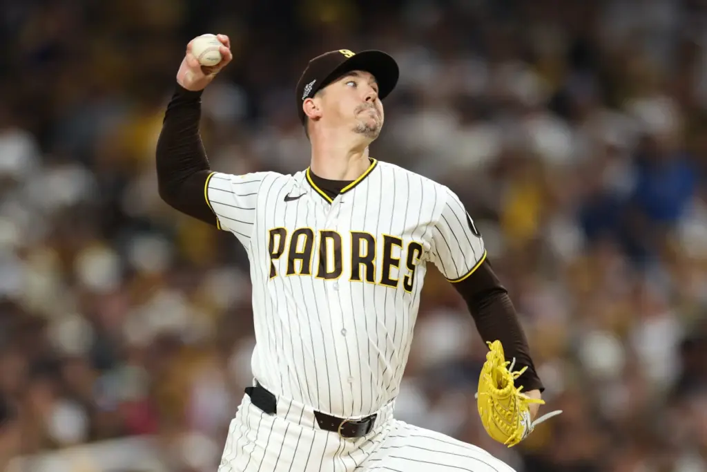 San Diego Padres starting pitcher Walker Buehler throws against the...
