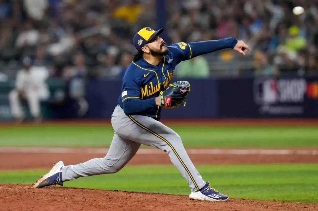 Milwaukee Brewers relief pitcher JoJo Romero throws to the plater...