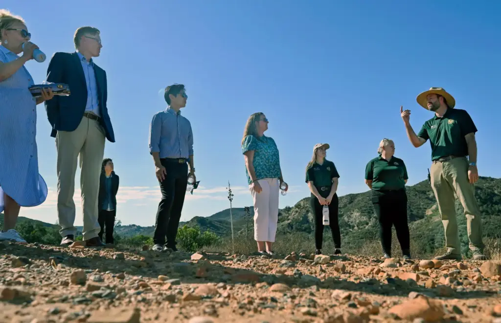 Mark Atkinson, far right, conducts a small tour of what...
