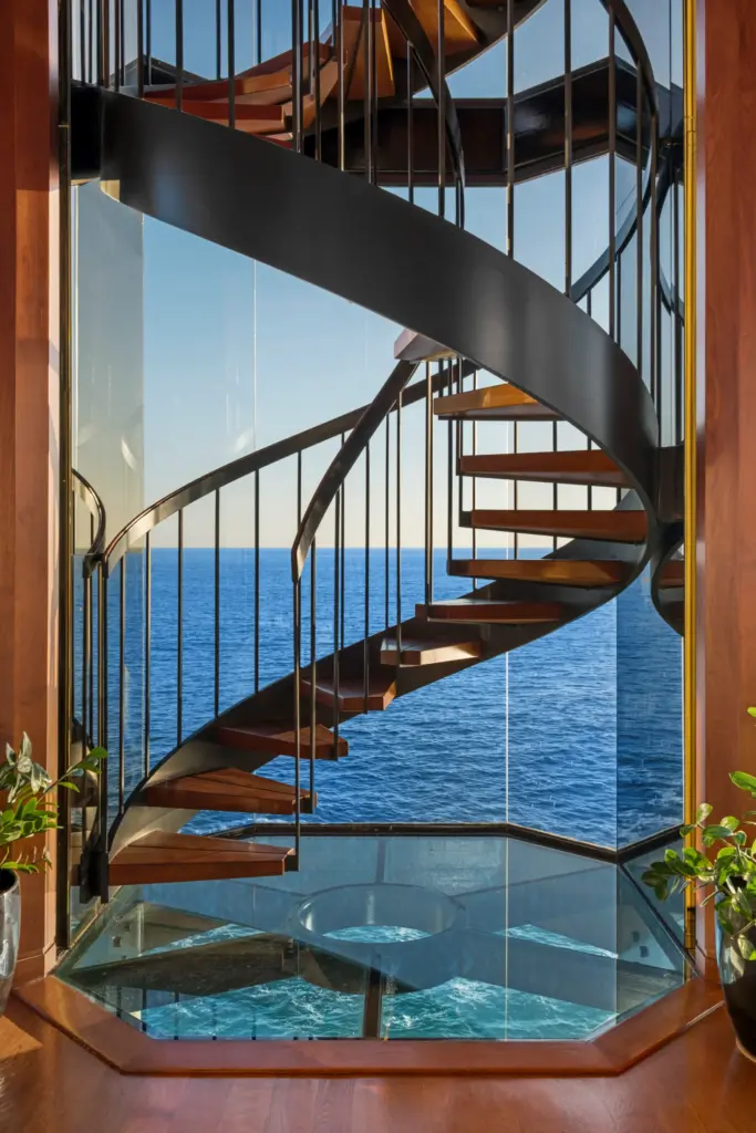 The spiral staircase and glass floor. (Photo by Chris Snitko,...