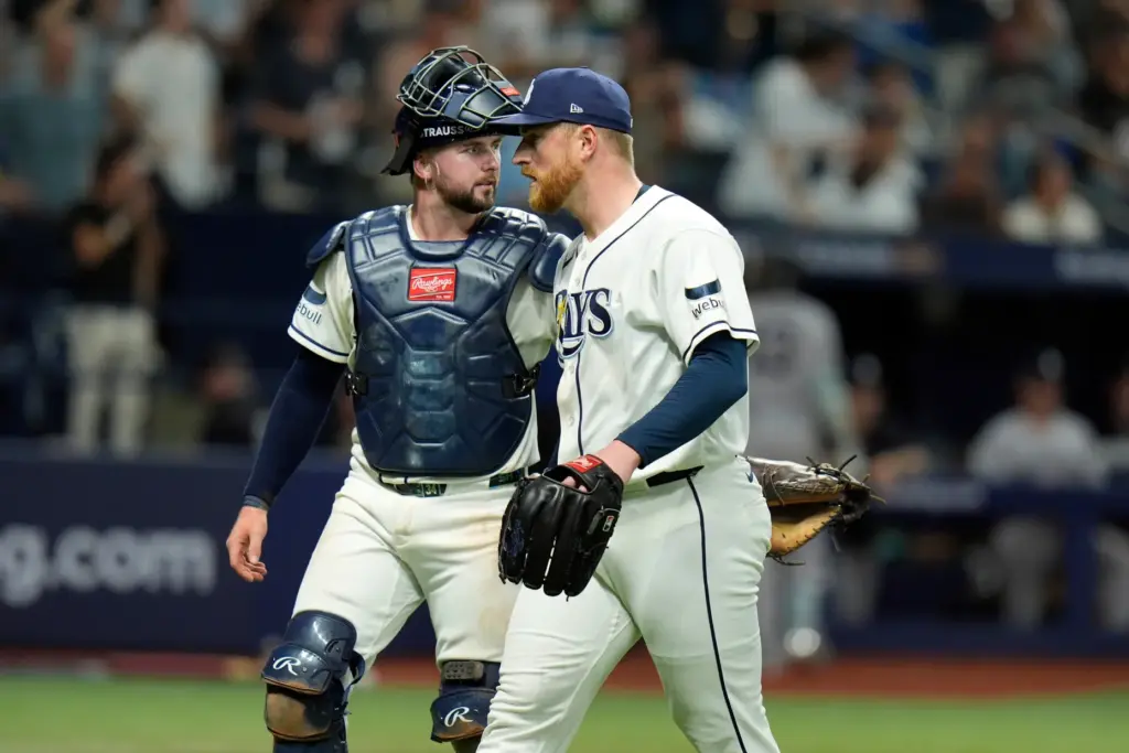 Tampa Bay Rays pitcher Drew Rasmussen, right, and catcher Liam...