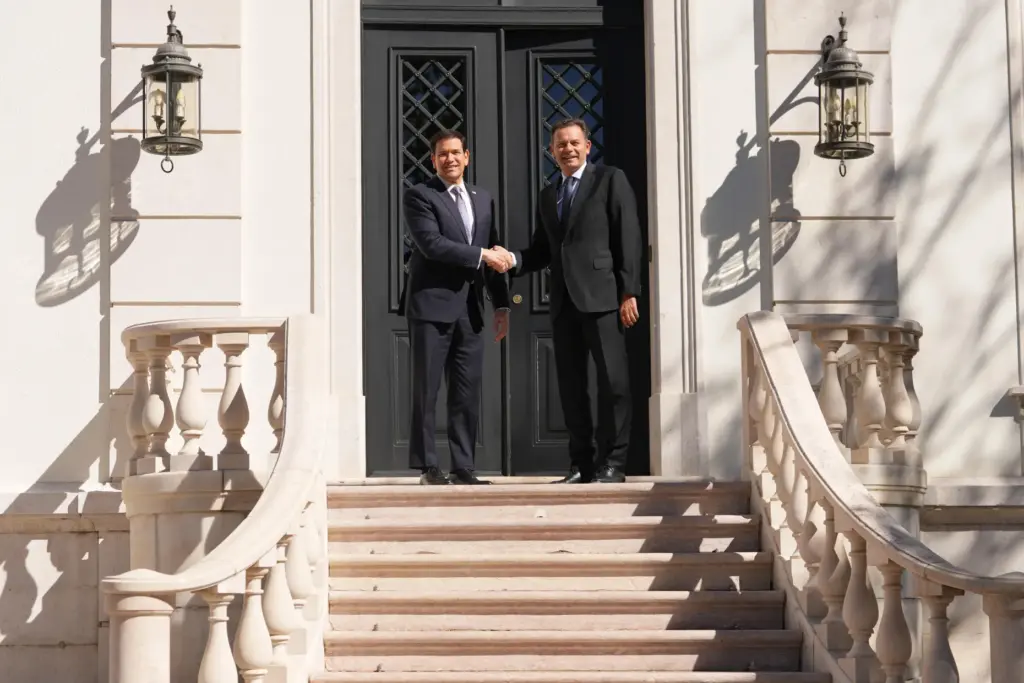 Secretary of State Marco Rubio is greeted by Portugal's Prime Minister Luis Montenegro.