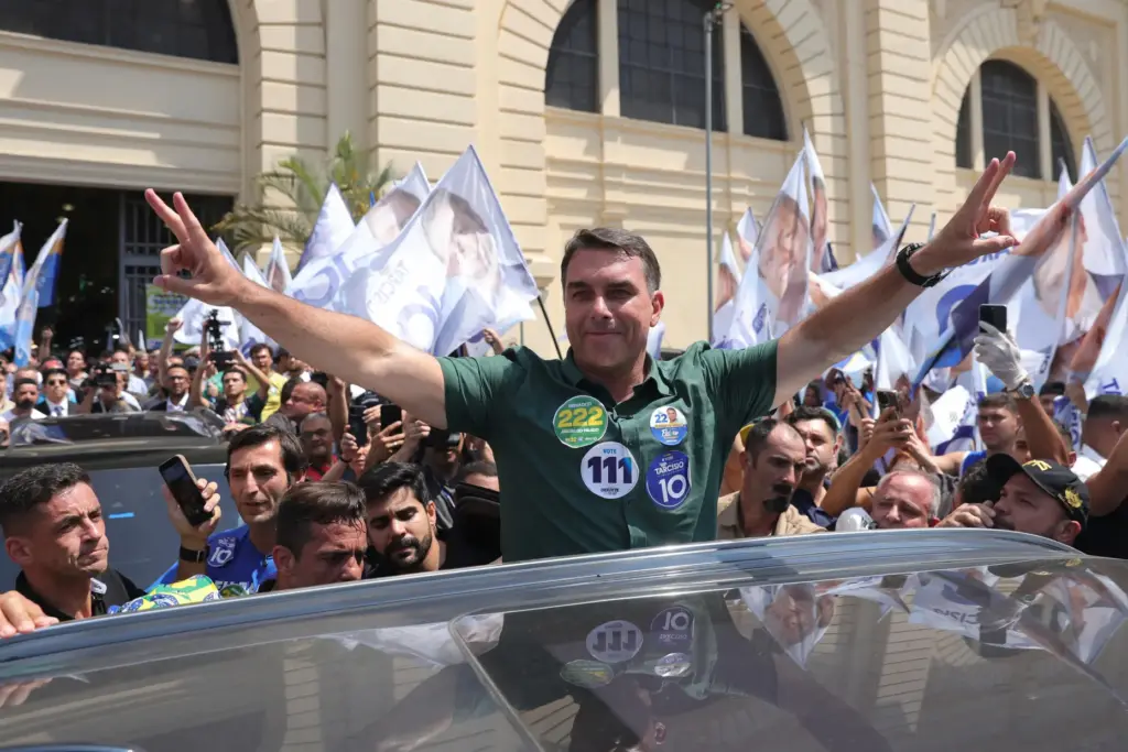 FILE – Opposition presidential candidate Sen. Flavio Bolsonaro gestures as...