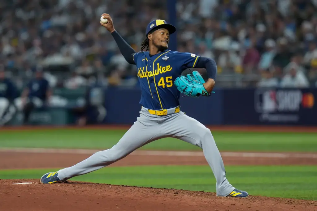 Milwaukee Brewers relief pitcher Abner Uribe throws to the plate...