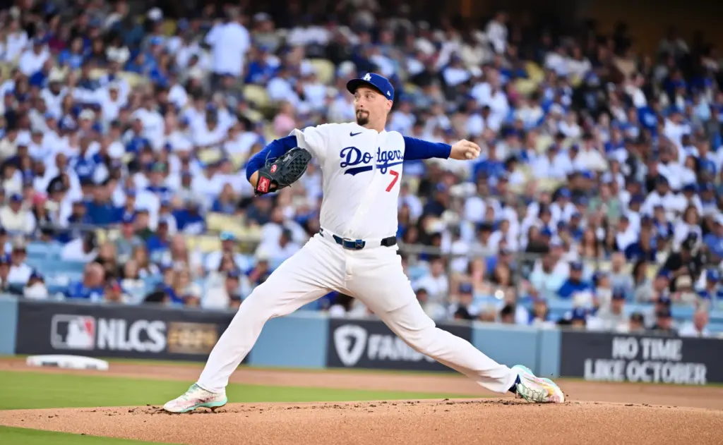 Dodgers starting pitcher Blake Snell throws to the plate during...
