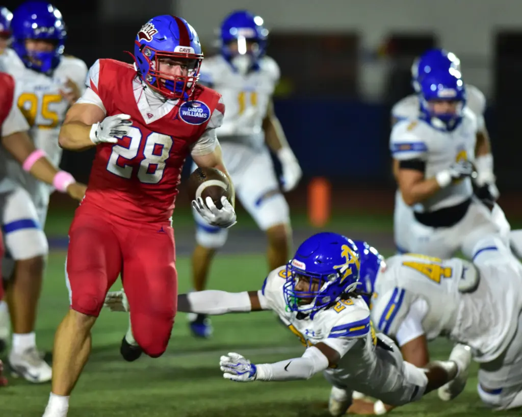 Serra running back AJ McBean runs thru Bishop Amat defense...
