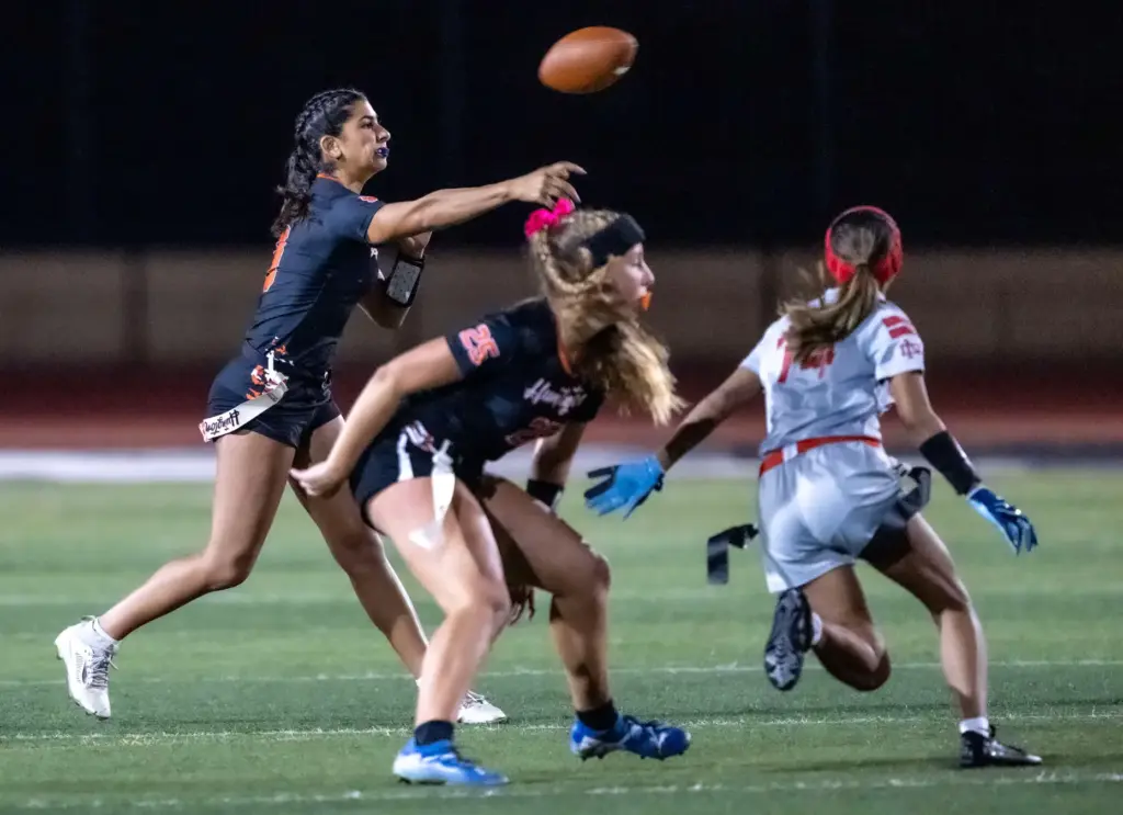 Huntington Beach quarterback Roxie Shaia (9) throws the ball during...