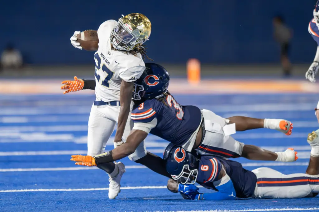 Notre Dame High Schoolâs Noel Washington (27) carries the ball...