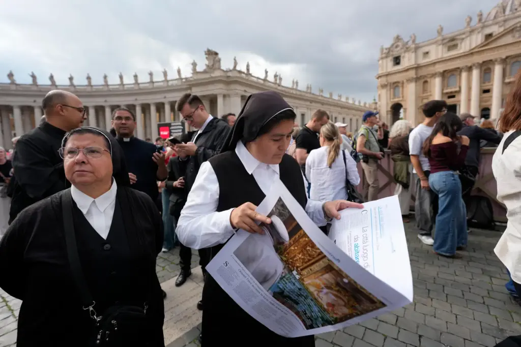 Nuns gather in St. Peter’s Square at the Vatican for...