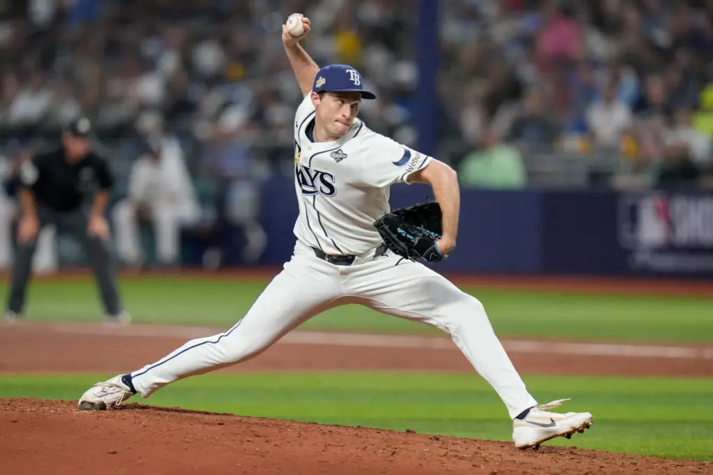Tampa Bay Rays relief pitcher Kevin Kelly throws to the...