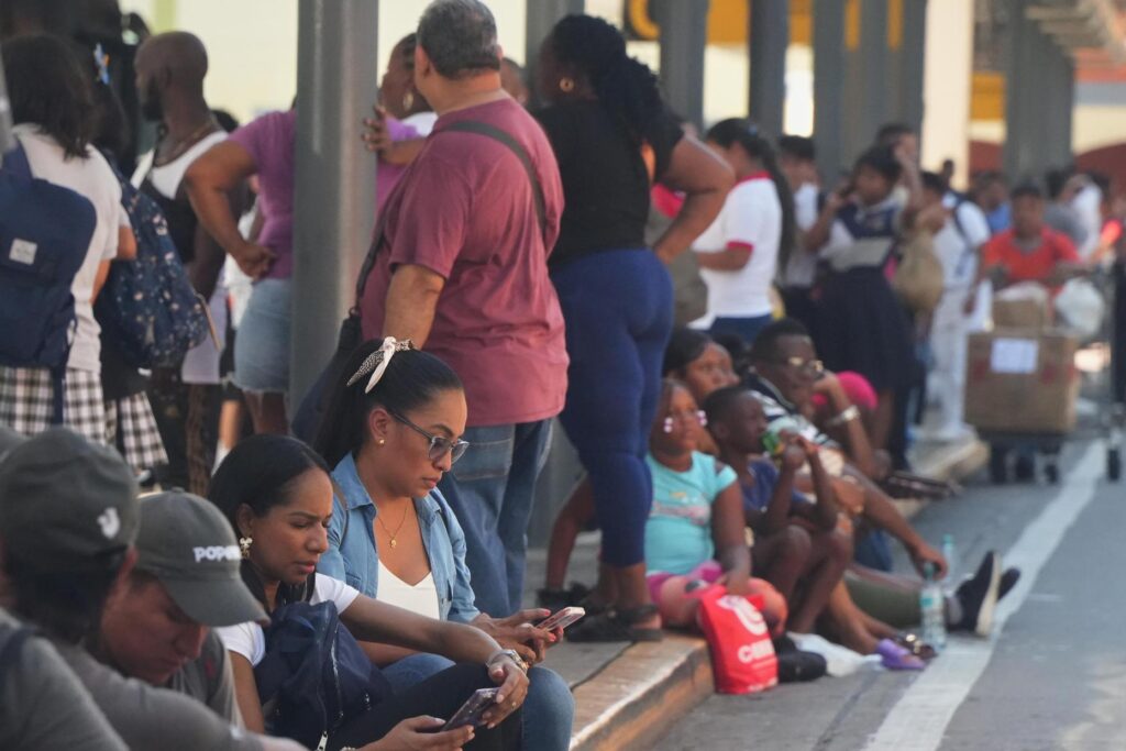 People gather outside shopping mall after an earthquake hit Panama...