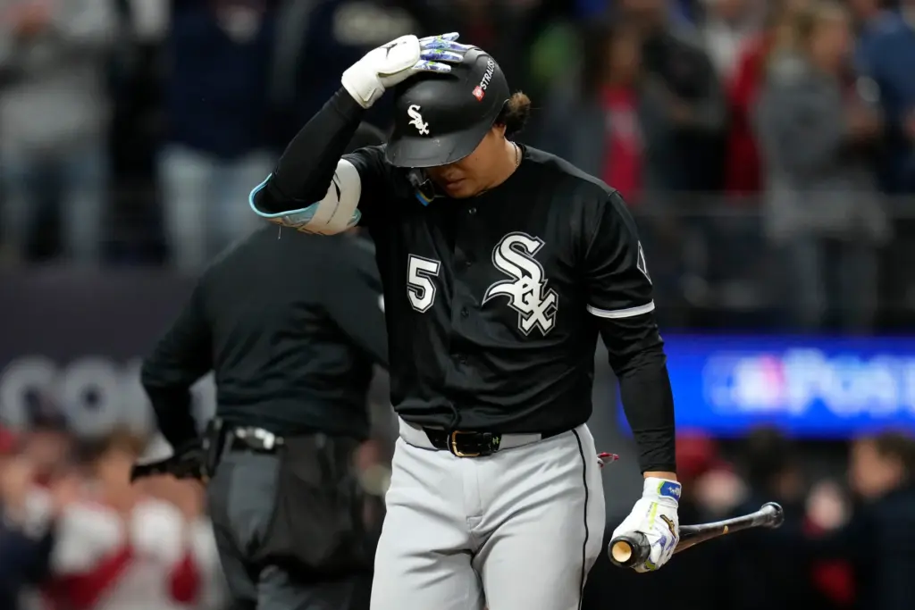 Chicago White Sox first baseman Munetaka Murakami walks back to...