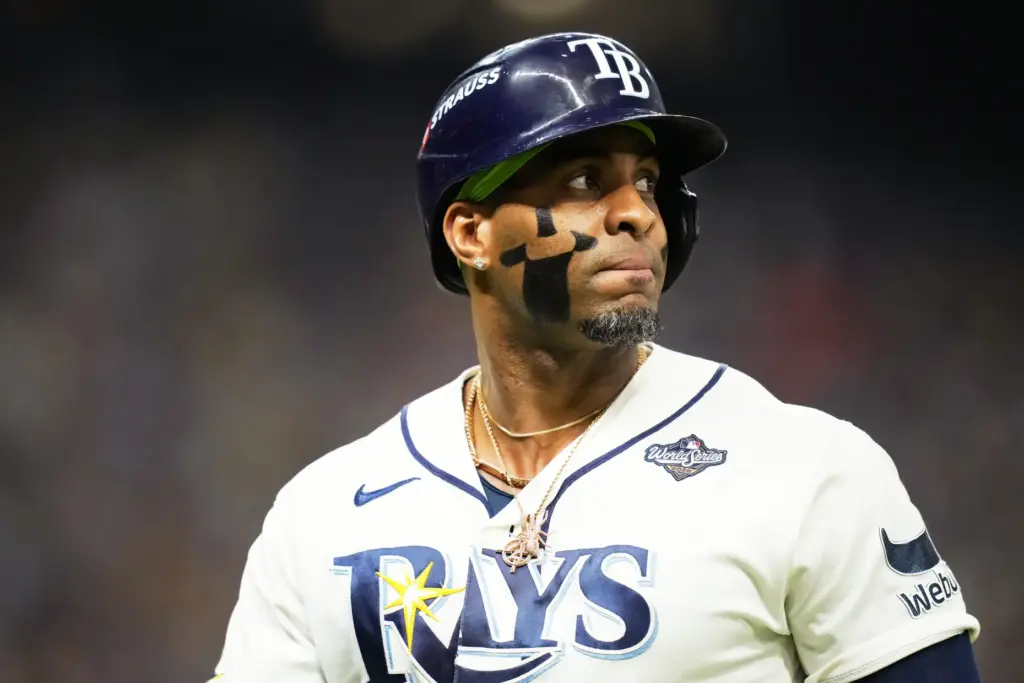Tampa Bay Rays’ Yandy DÃ­az reacts after making an out...
