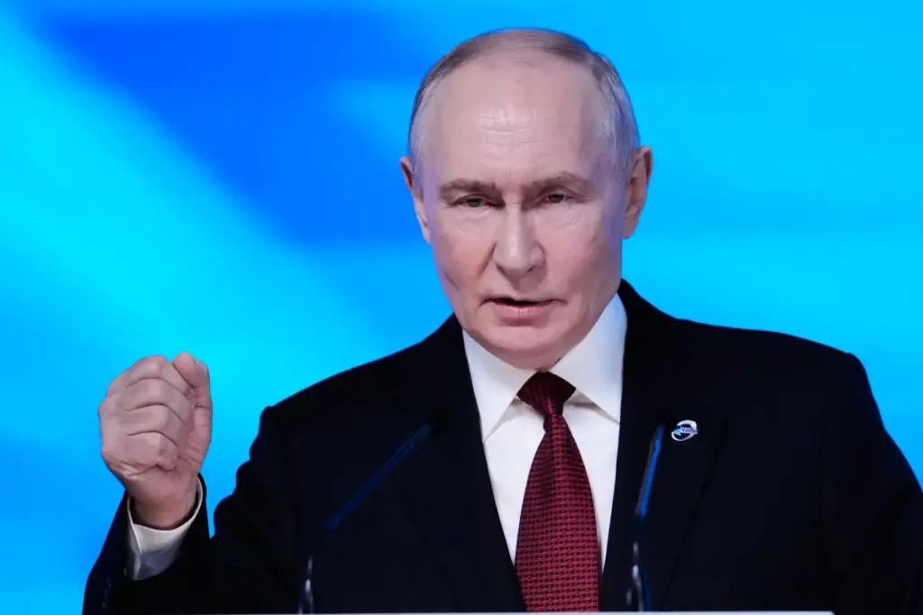 Russian President Vladimir Putin speaks at the session of the...