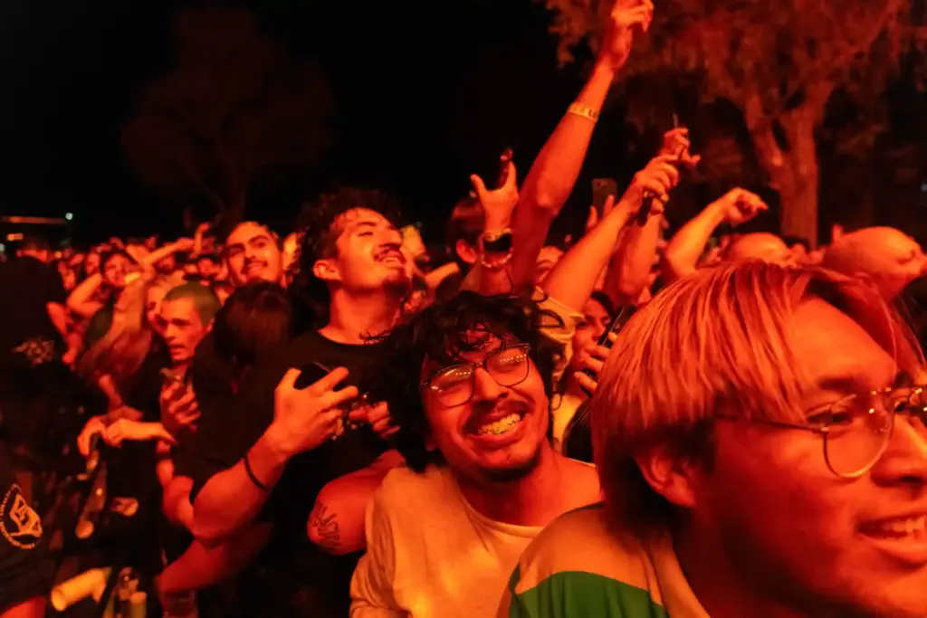 Members of the crowd enjoy Turnstileâs set for their Never...