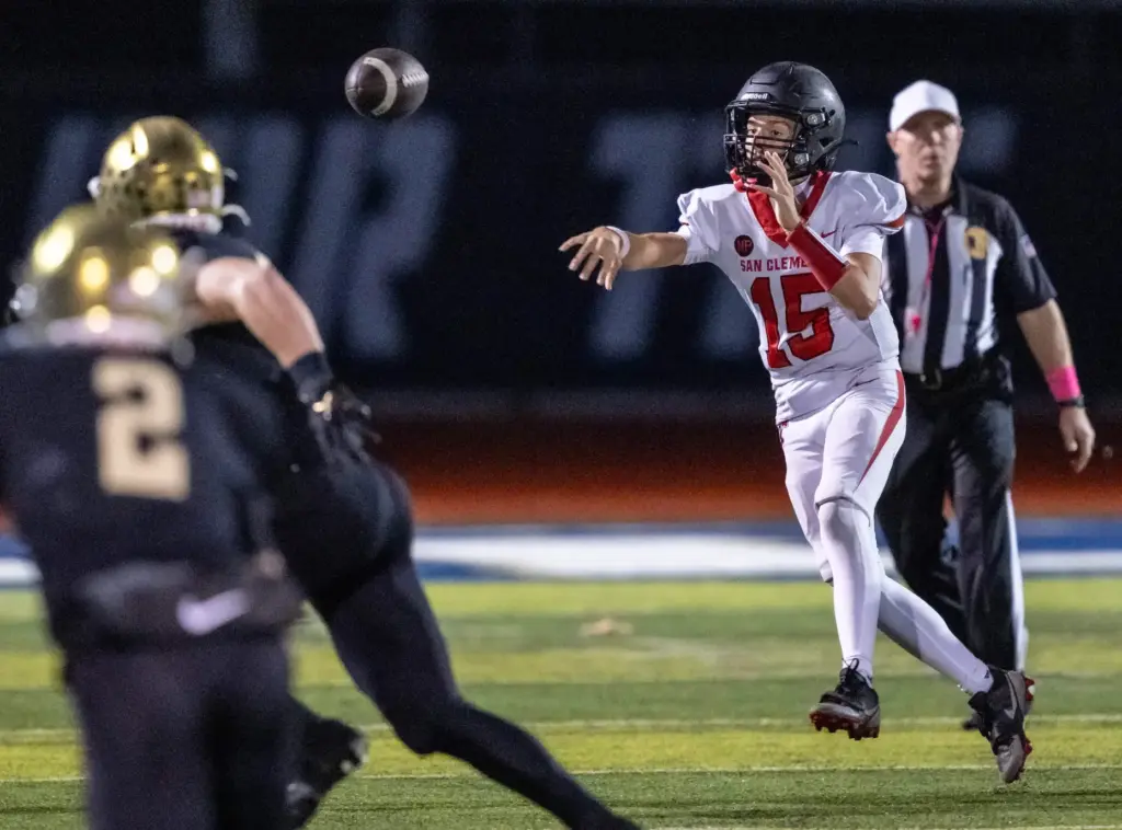 San Clemente quarterback Koston James (15) throws the ball during...