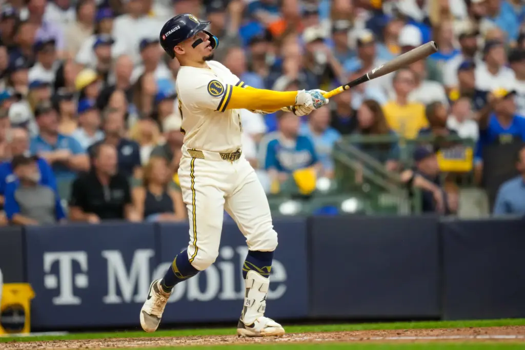 The Milwaukee Brewers’ William Contreras watches the flight of his...