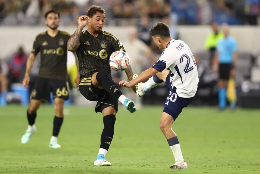 Los Angeles FC forward Armindo Sieb, left, vies for the...