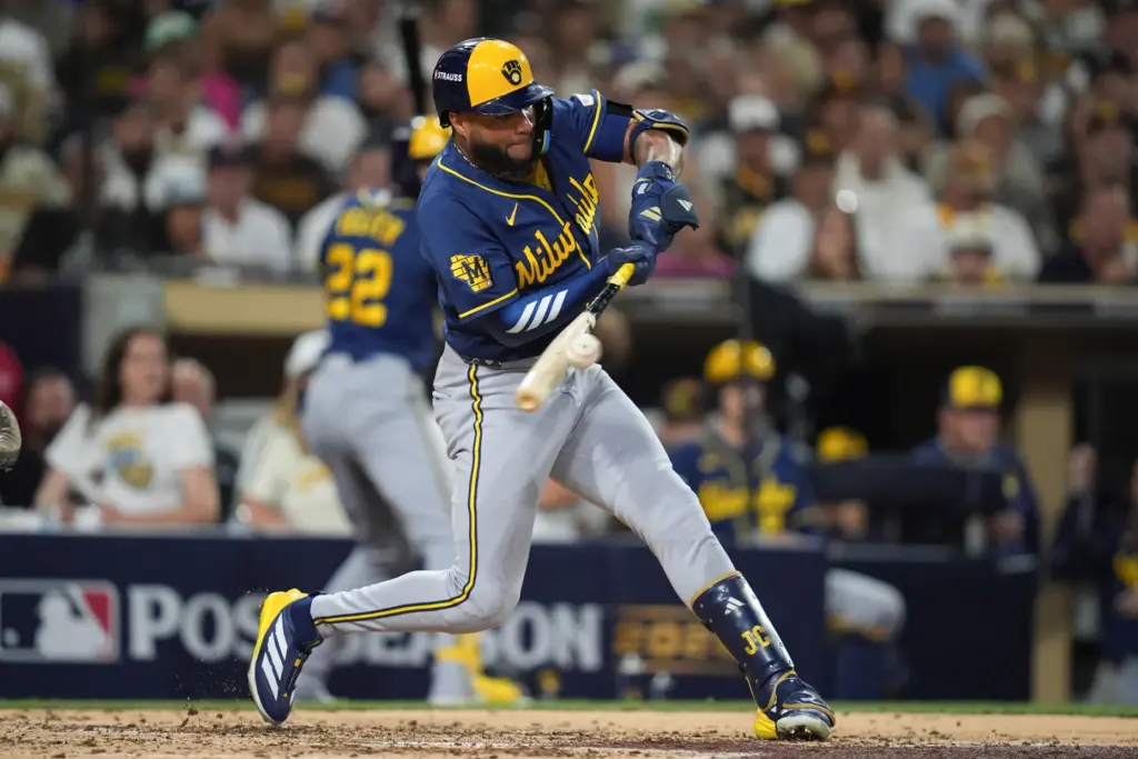 The Milwaukee Brewers’ Jackson Chourio connects for an RBI single...