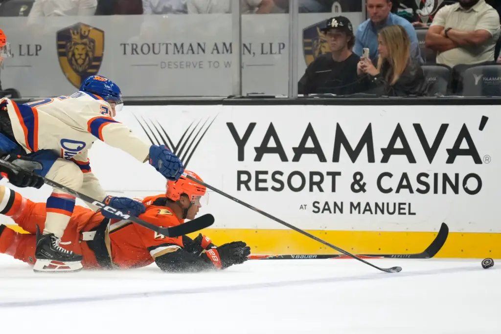 Edmonton Oilers left wing Alex Formenton, left, and Ducks defenseman...