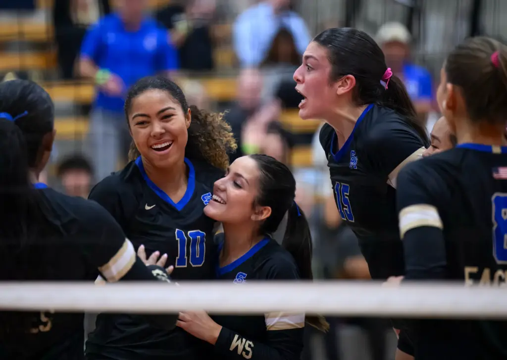 Santa Margarita’s Ireland Real, right, celebrates a score with her...