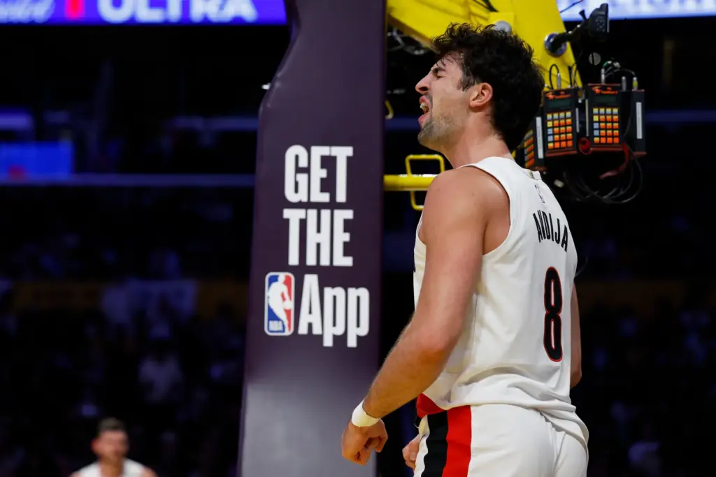 Portland Trail Blazers forward Deni Avdija reacts after scoring during...