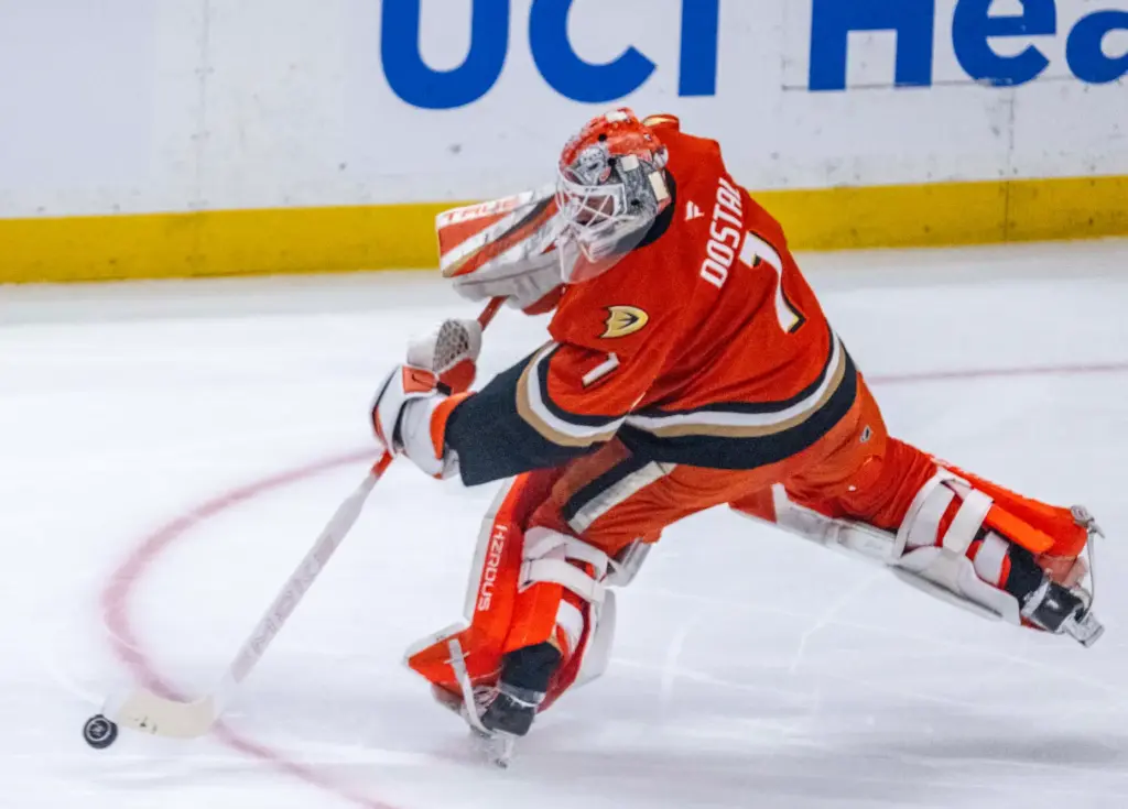 Ducks goaltender Lukas Dostal comes out of the goal to...