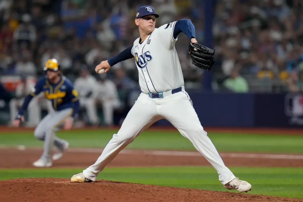 Tampa Bay Rays relief pitcher Tyler Wells throws to the...