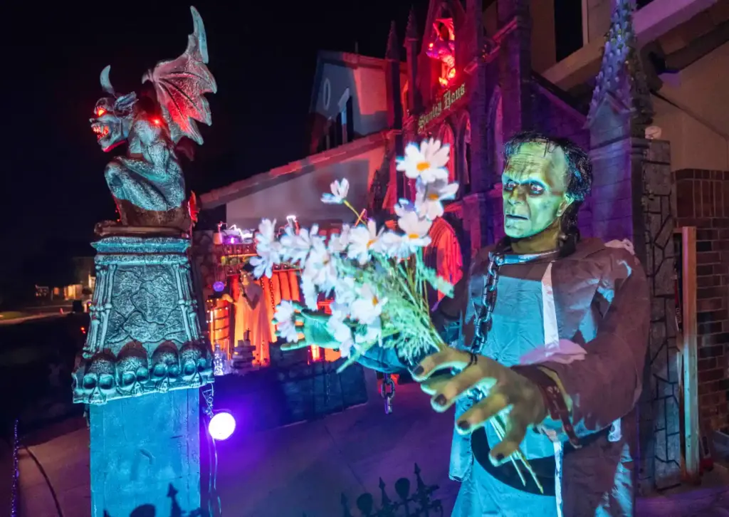 An elaborate Frankenstein-themed display, part of a Universal Pictures-themed cul-de-sac,...