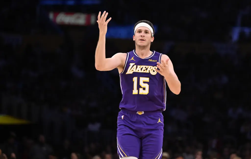 Lakers guard Austin Reaves gestures during the second half of...