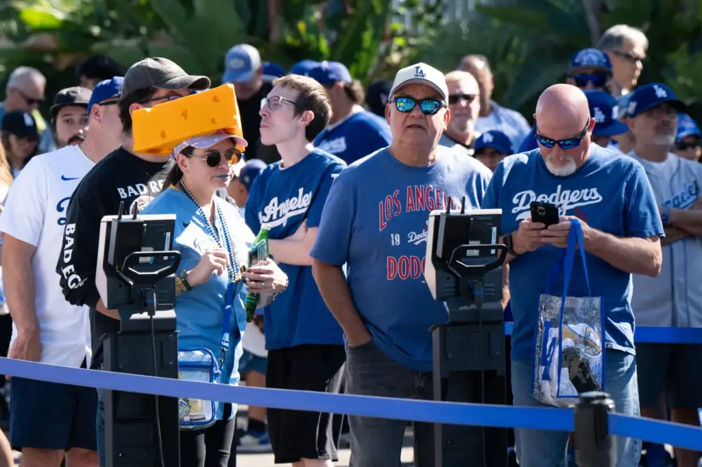 Fans line up before Game 3 of the National League...