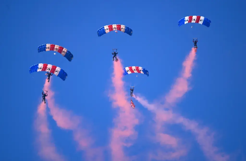 The Royal Air Force Falcons Parachute Team perform during the...