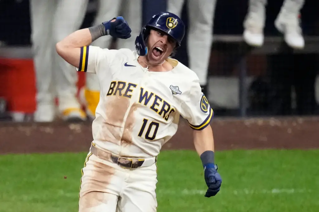 The Milwaukee Brewers’ Sal Frelick celebrates as he runs the...