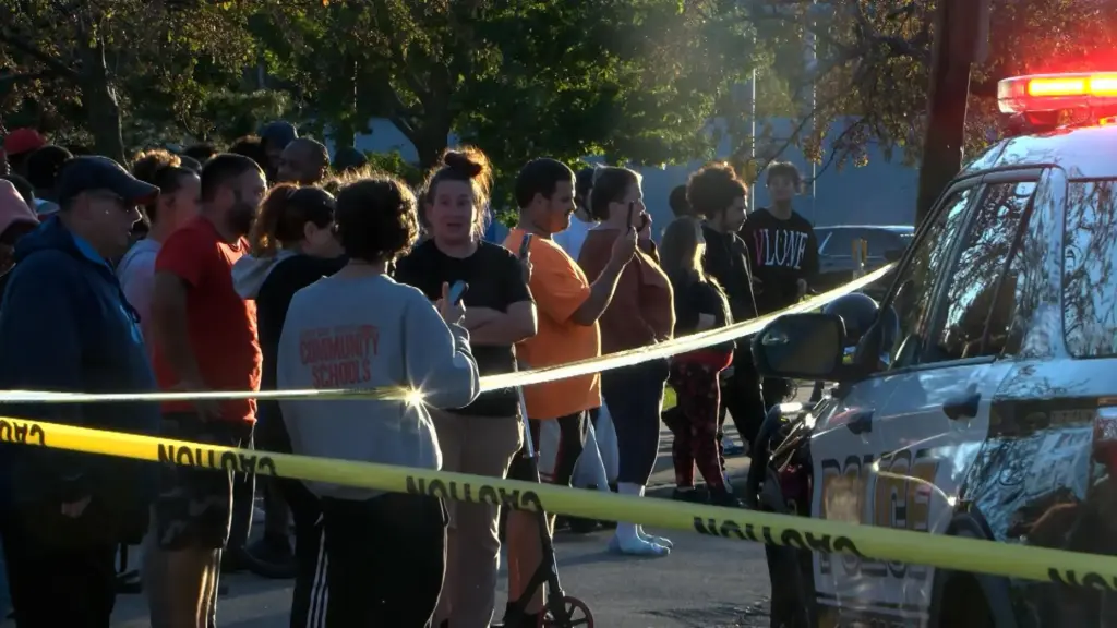 Police gather outside the scene of a shooting in Erie, Pennsylvania.